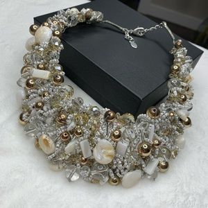 Aldo necklaces with bronze, white stones.